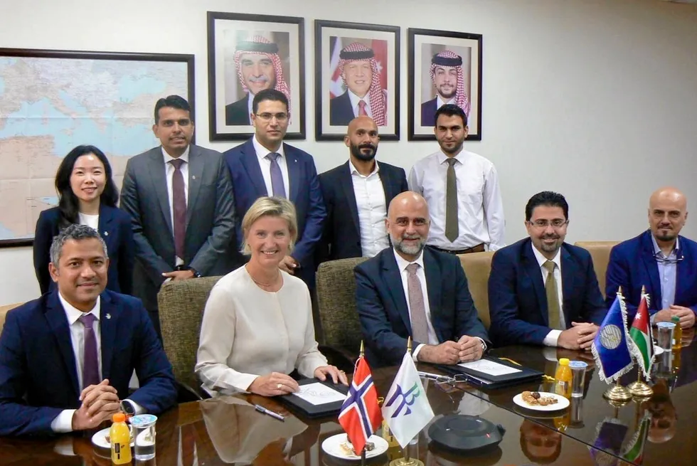 BW LNG chief executive, Yngvil Asheim, (second left) and National Electric Power Company managing director, Sufian M Al-Bataineh, (on her left) seal the deal for the Jordan FSU.