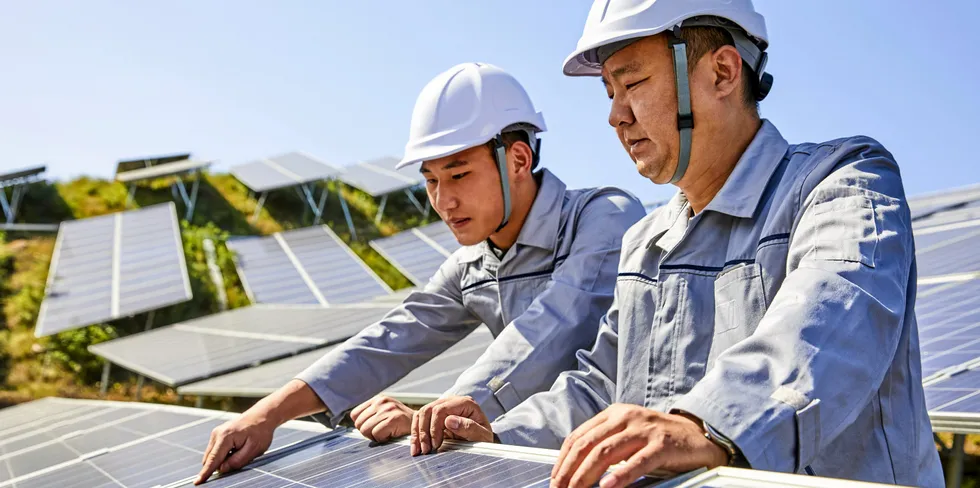 Engineers install PV in China - but will enough land be available?