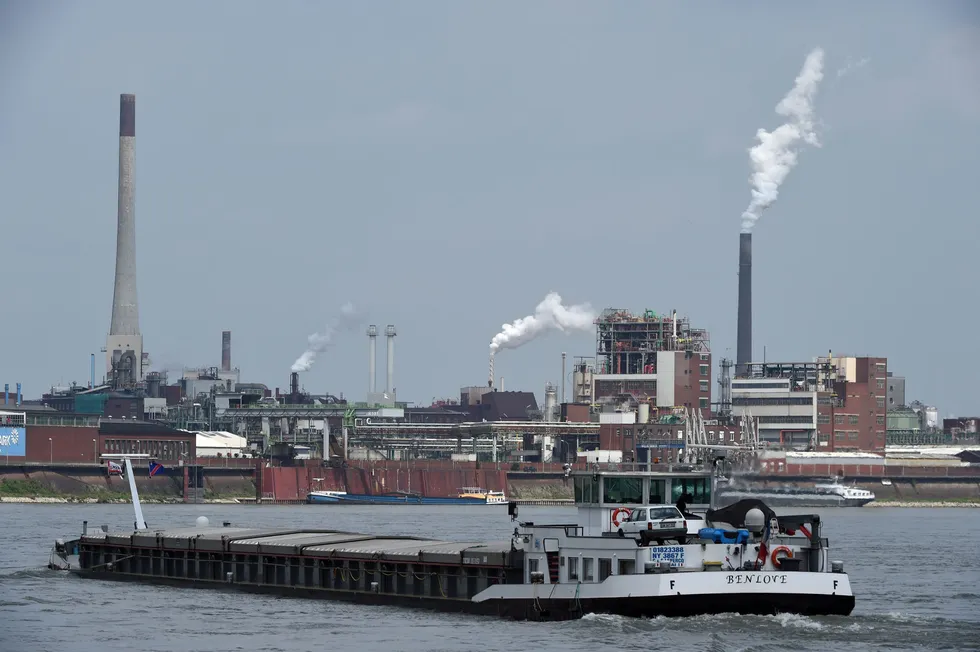 Barging forward: a cargo makes its way on the Rhine river near the Chempark chemical park in Krefeld, western Germany