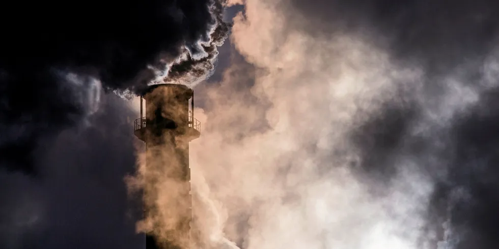 Steam and exhaust rise from a German steel mill