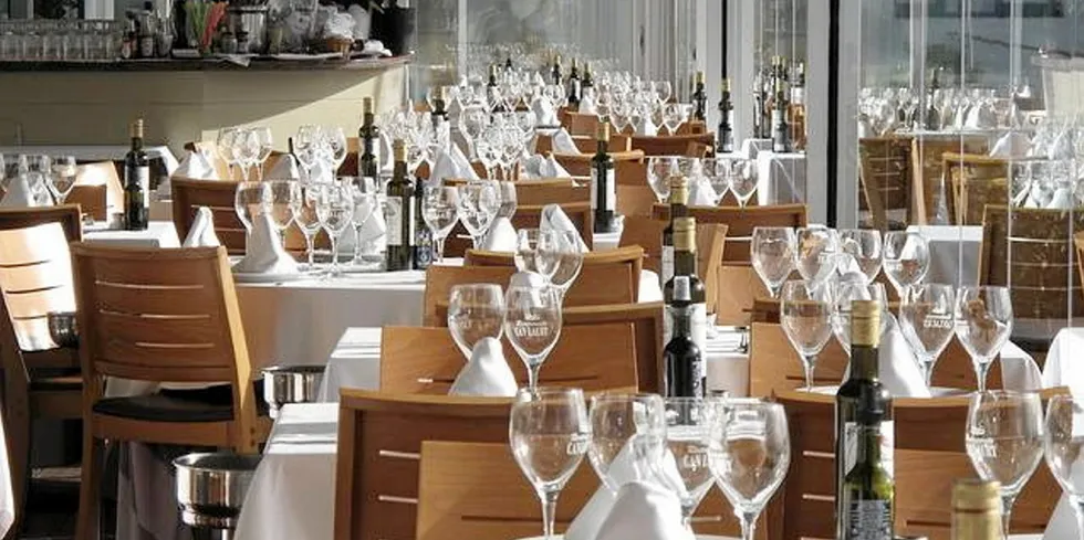 An empty white tablecloth restaurant awaiting diners. Seafood suppliers to foodservice are concerned declining UK consumer confidence may take a heavy toll on sales.