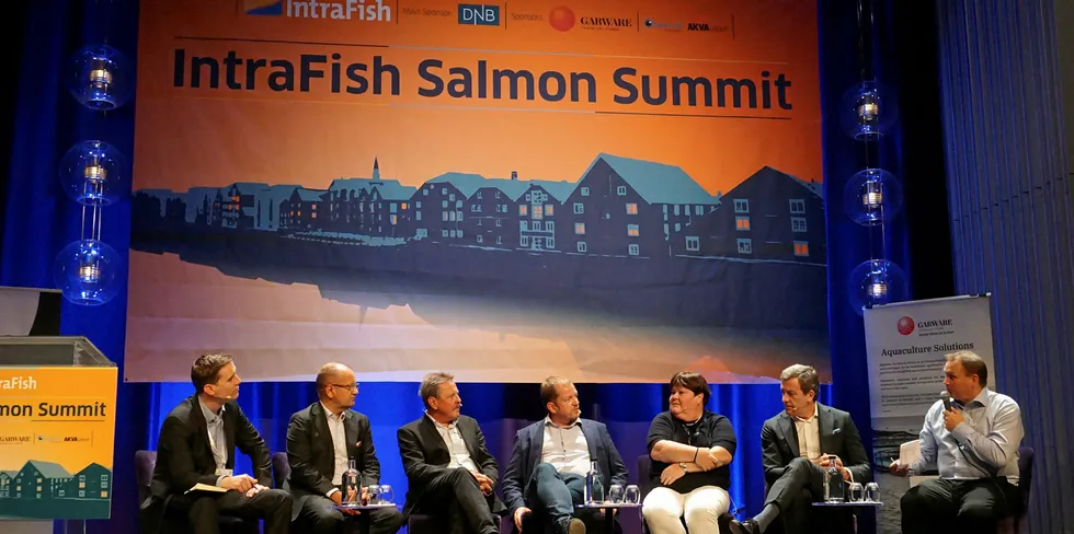 The panel for The IntraFish Salmon Summit during Aquanor 2019. From left to right: Drew Cherry, Dag Sletmo, Thor Hukkelas, Klaus Hatlebrekke, Anne Osland, Ricardo Garcia, Joar Grindheim.