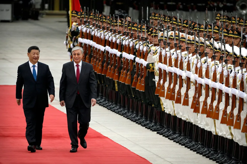 Co-operation: Chinese President Xi Jinping (left) and Kazakhstan President Kassym-Jomart Tokayev attend a ceremony at the Great Hall of the People in Beijing.