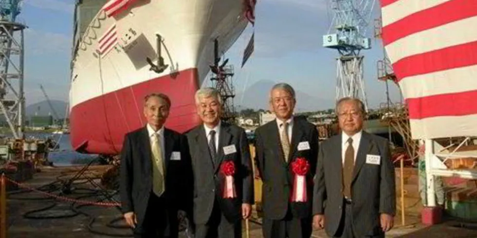 Yuji Igarashi (second from left) with colleagues at a Maruha Nichiro vessel launch in 2009.