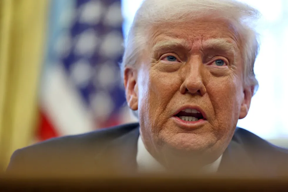 US President Donald Trump speaks to reporters in the Oval Office at the White House in Washington, on Wednesday.