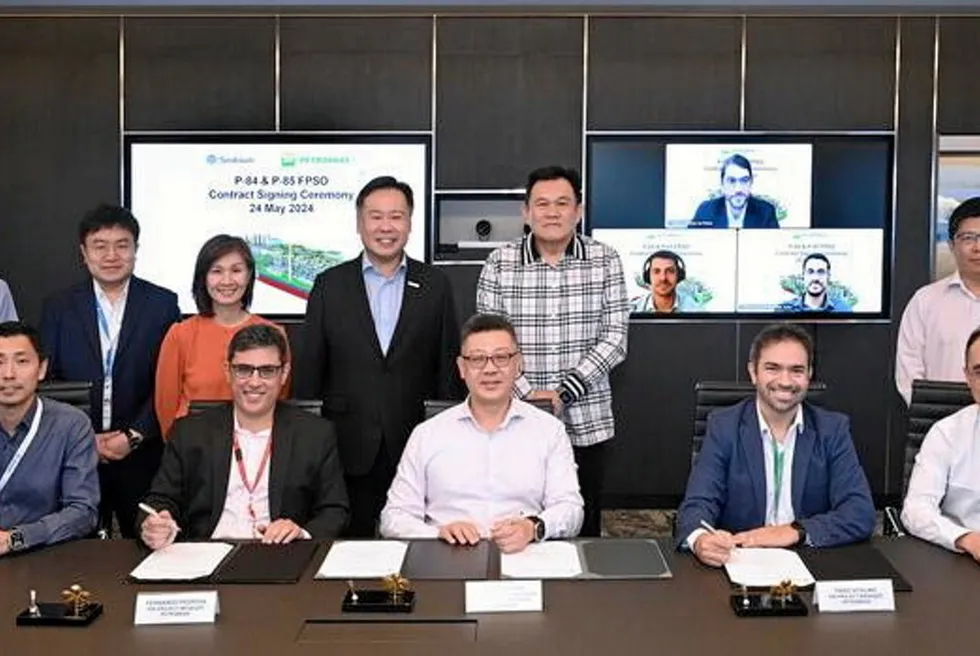 Signing ceremony for Petronas' P-84 and P-85 FPSOs.