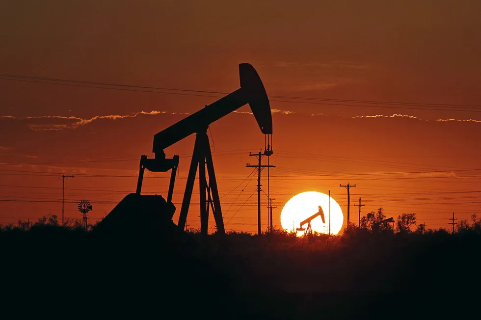 A pump jack operates in an oilfield in the Permian basin in Texas.
