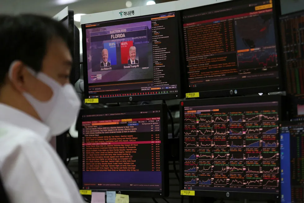 Watching closely: prices rose in early trade but traders are closely watching the result of the US election