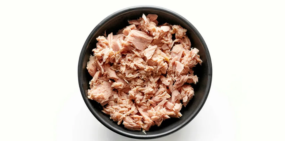 . canned tuna in a bowl.