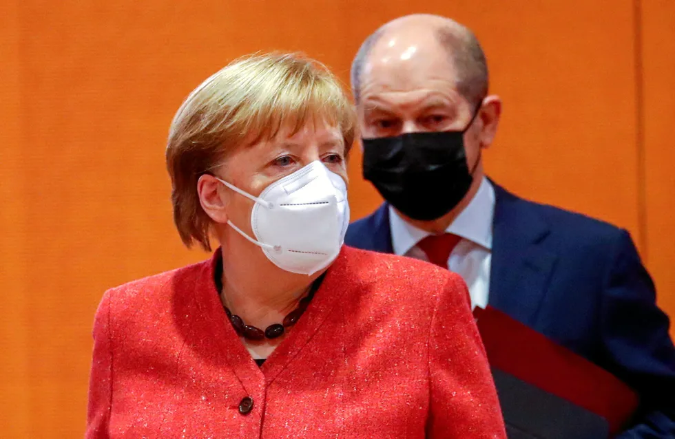 Follow the leader: German Chancellor Angela Merkel and Finance Minister Olaf Scholz, who is running as leader of Merkel's CDU party in this weekend's election