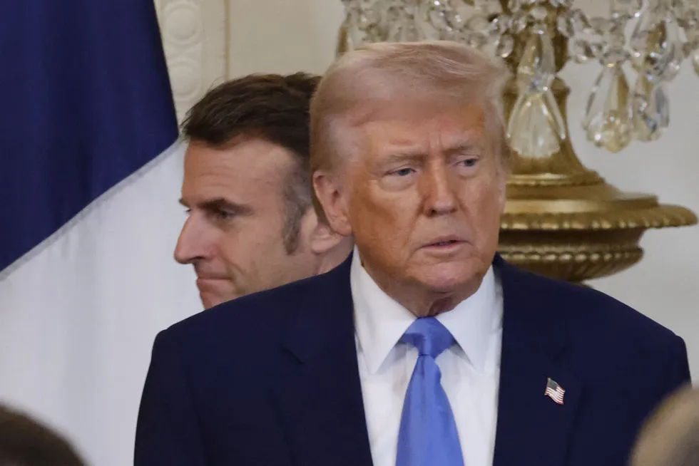 US President Donald Trump and French President Emmanuel Macron hold a joint press conference in the East Room of the White House in Washington, DC, on 24 February.