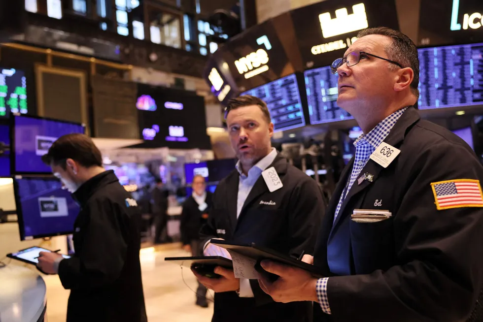 Bank jitters: traders on the floor of the New York Stock Exchange saw fears around the health of European lender Credit Suisse triggering a sell off in equities and commodities on Wednesday.