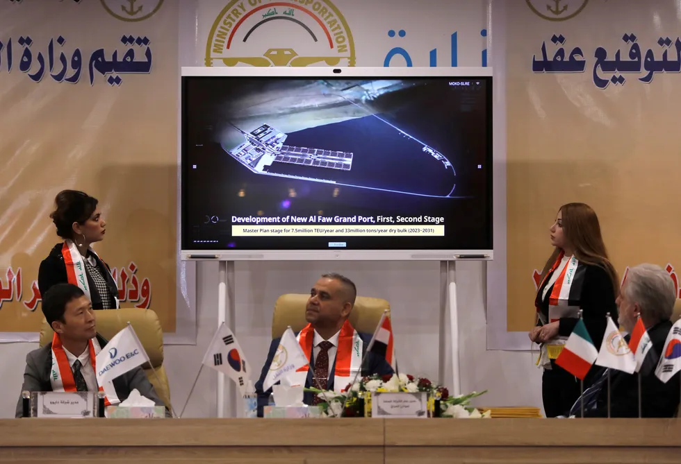 Port plan: Iraq's director general at the General Company for Ports, Farhan al-Fartousi, signs a contract with South Korea's Daewoo Engineering & Construction, to construct the Grand Faw port