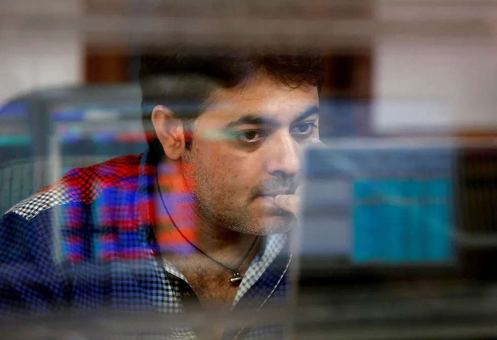 OIL PRICE UP: A broker watches as oil prices rose more than 2% on Wednesday