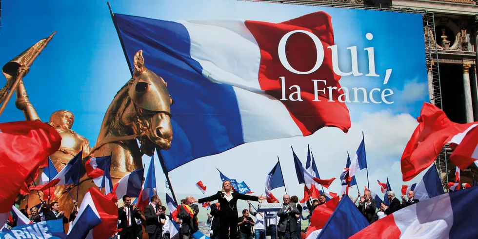 Marine Le Pen delivers a speech before an adoring crowd. Photo: Francois Lochon/Gamma-Rapho/Getty