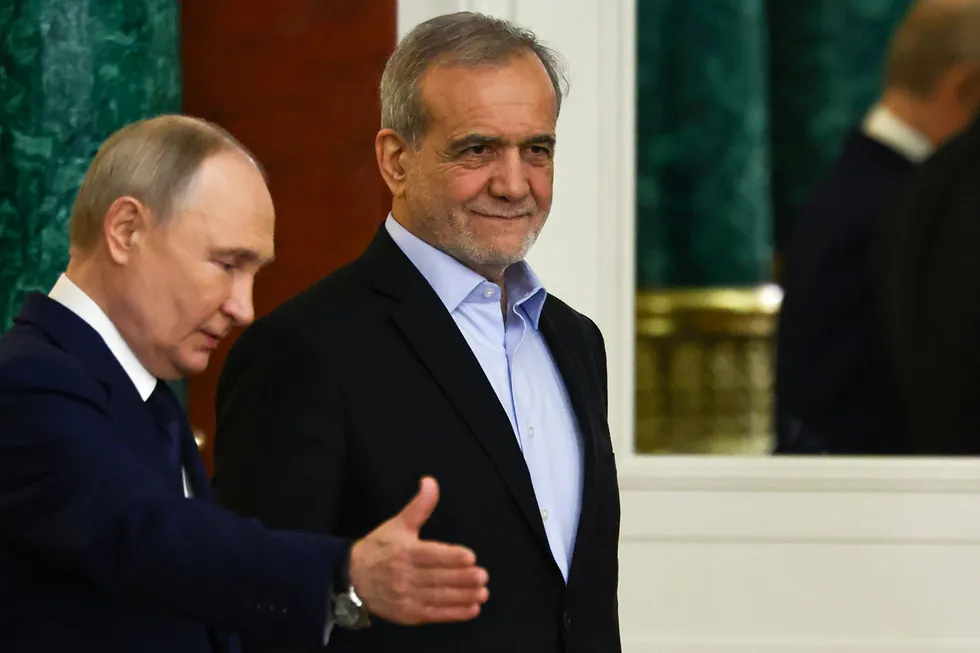 Russian President Vladimir Putin (left) and Iranian President Masoud Pezeshkian.