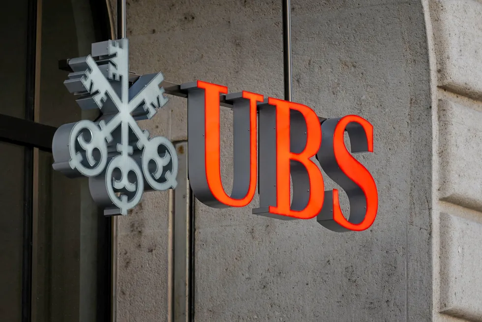 A picture taken on October 25, 2022 shows a sign of Swiss banking giant UBS on a branch in Basel, Switzerland.