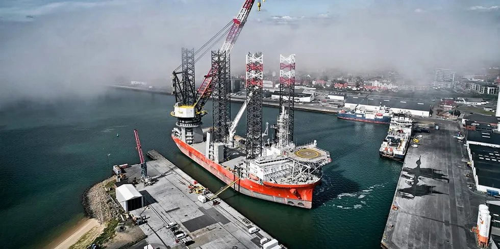 Cadeler's offshore wind installation vessel Pacific Osprey with an upgraded crane boom at the Port of Esbjerg, Denmark.