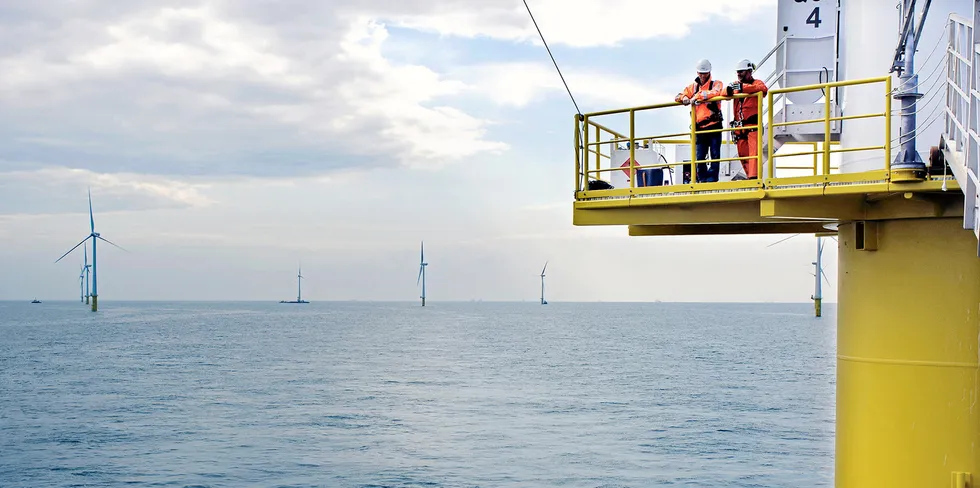 Two workers at an offshore wind farm in the Dutch North Sea