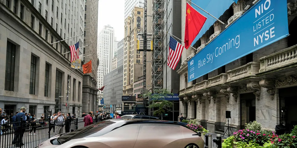 A vehicle from electric car maker NIO sits outside of the New York Stock Exchange (NYSE) in New York City.