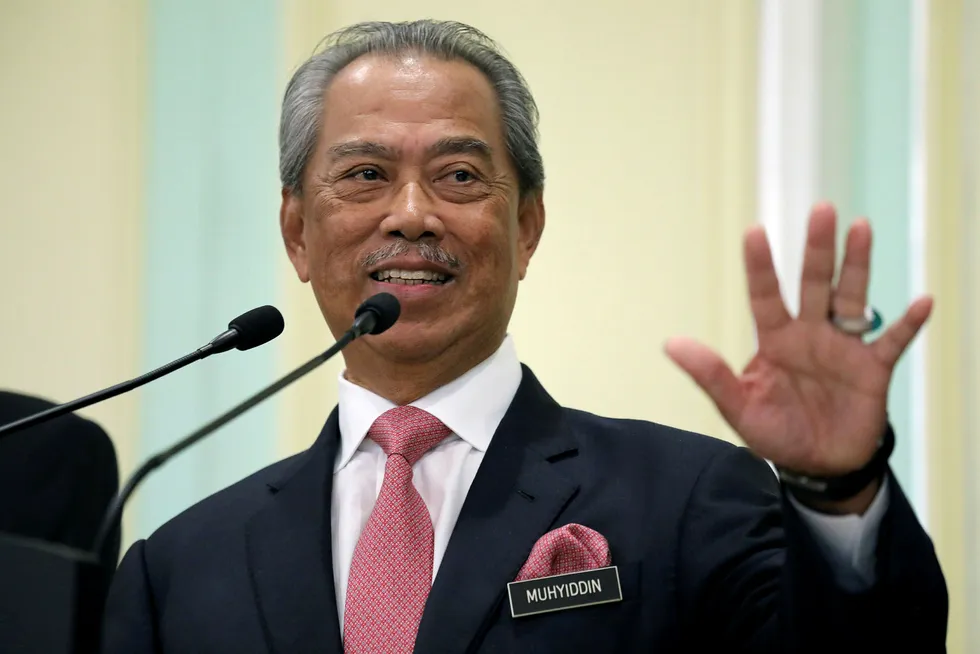 Not at odds: Malaysia's Prime Minister Muhyiddin Yassin and national oil company Petronas are on the same page
