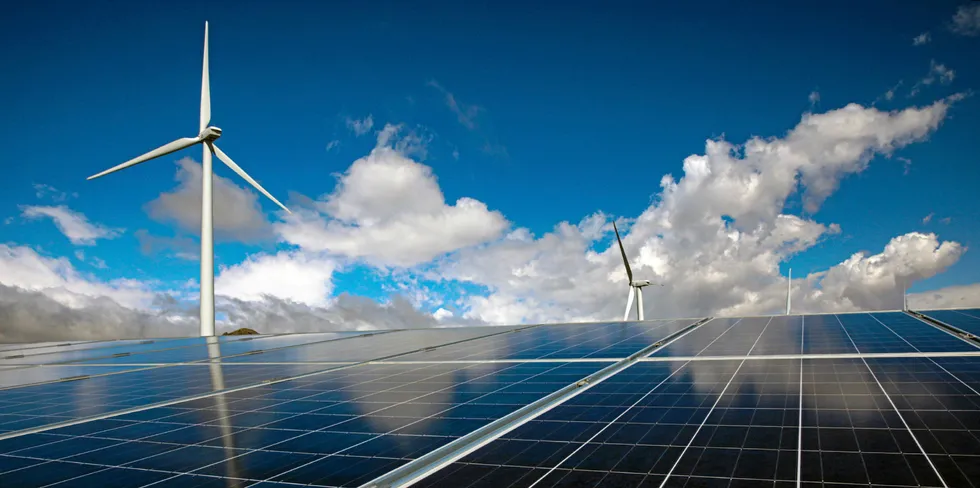 Wind turbines and solar panels.