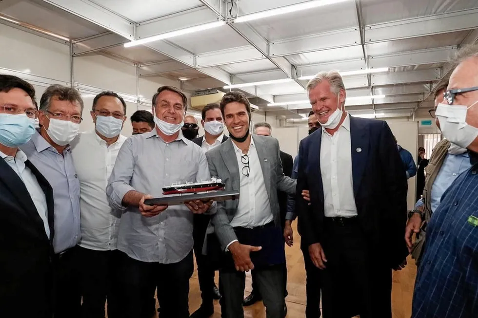 Slipped: Golar LNG chairman Tor Olav Troim meets Brazil President Jair Bolsonaro after visiting the country last year