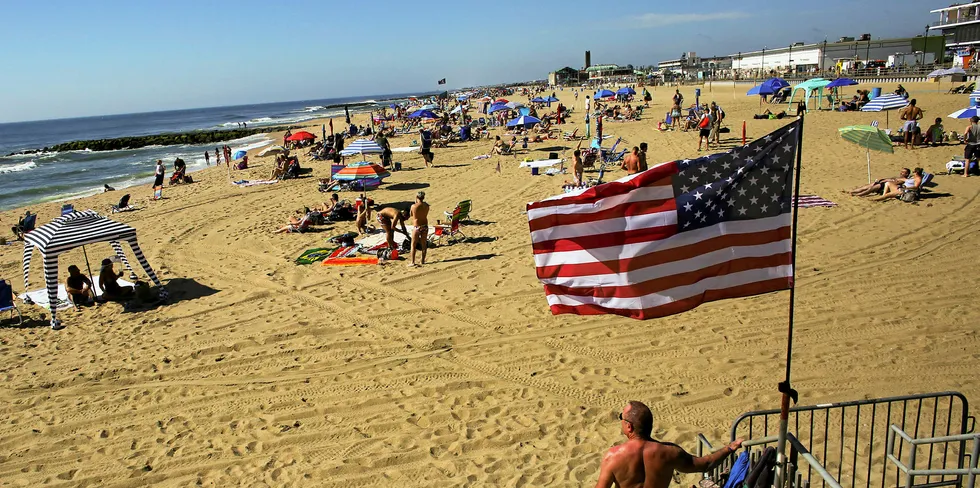 ASBURY PARK, NJ - MAY 26: People visit the beach during Memorial Day weekend on May 26, 2019 in Asbury Park, New Jersey.