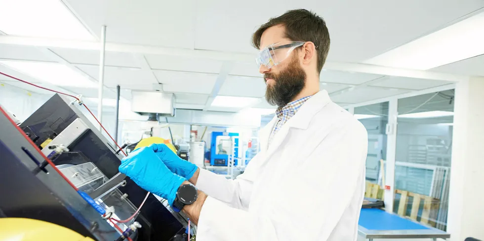 A Zinc8 technician in the lab