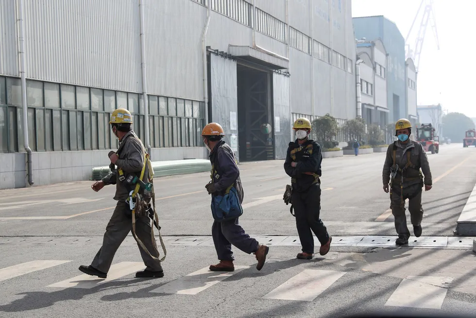 Disruption: Chinese shipyard workers have faced heavy restrictions during the country's stringent zero-Covid procedures.