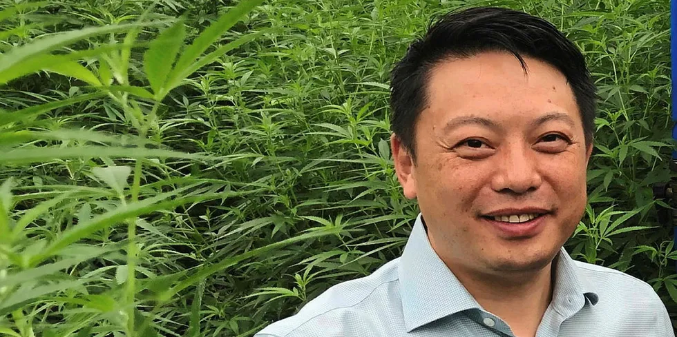 Hudson Valley Fisheries' John Ng in the hemp greenhouse in New York, where he also raises steelhead trout.
