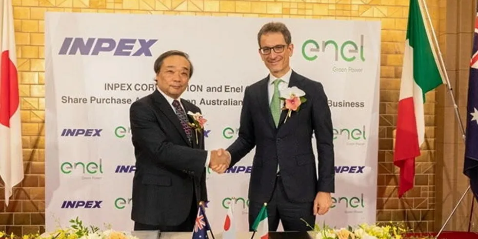 INPEX and Enel executives sign the agreement.