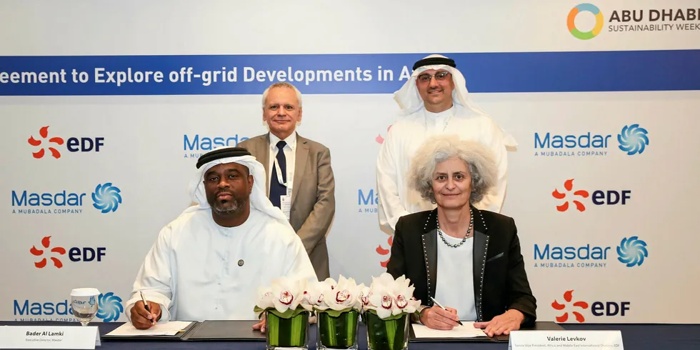 Bader Al Lamki, Masdar’s executive director for clean energy, and Valérie Levkov, senior vice president for Africa and Middle East at EDF.