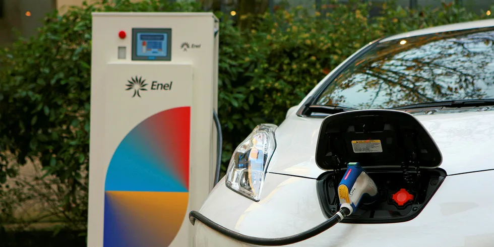 A Nissan Leaf EV plugged into Enel's V2G charger