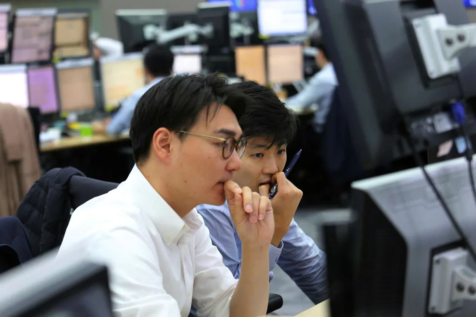 Falling prices: oil dropped in early trade after China lowered its economic growth target