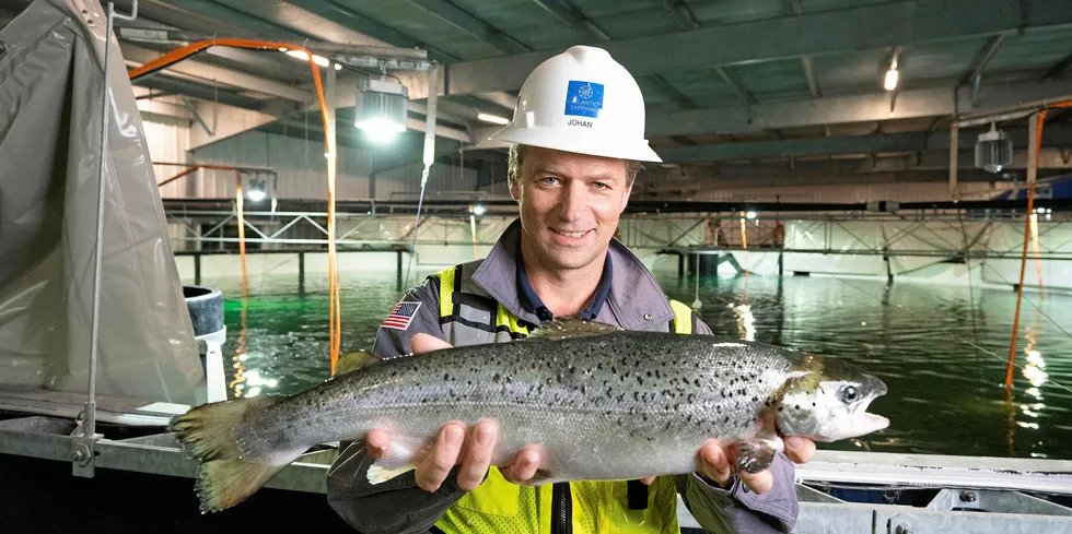 Atlantic Sapphire founder Johan Andreassen with Atlantic Sapphire's first salmon produced in the US.