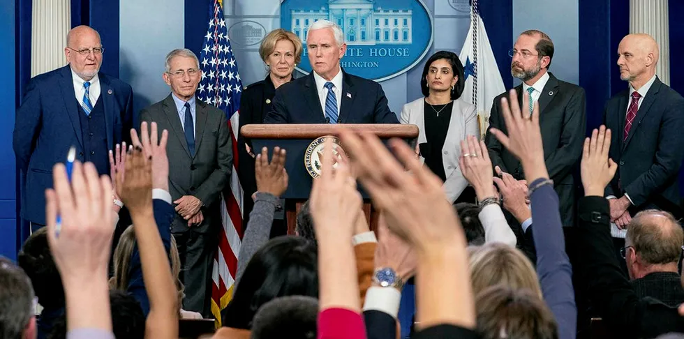 US vice president Mike Pence takes questions from reporters on the White House's response to Covid-19