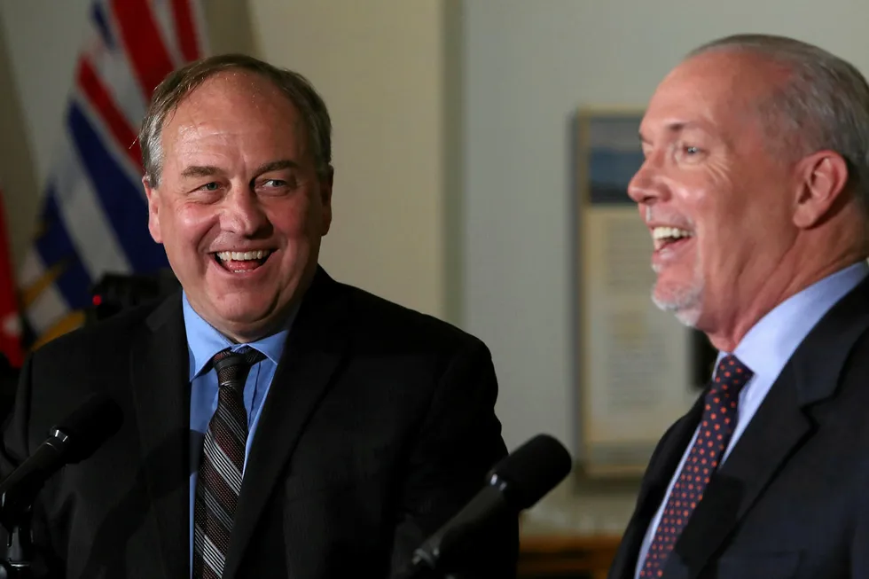 Opposition: British Columbia's Green Party leader Andrew Weaver (left) and New Democratic Party leader John Horgan