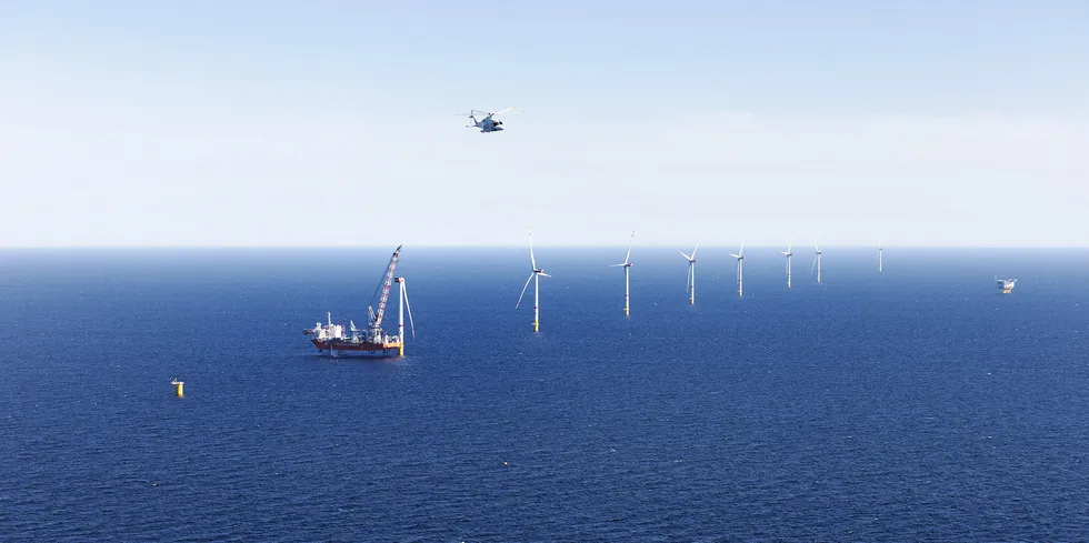 HeliService helicopter by servicing offshore wind farm.