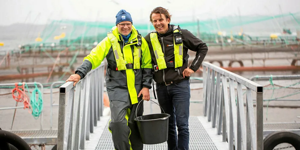 Jan Ivar Bildoy, Blom Fiskeoppdrett, pictured with Oystein Larsen, aqua division manager for Alltech Norway, at one of the salmon farms participating in Alltech and Nofima research into sustainable salmon production.