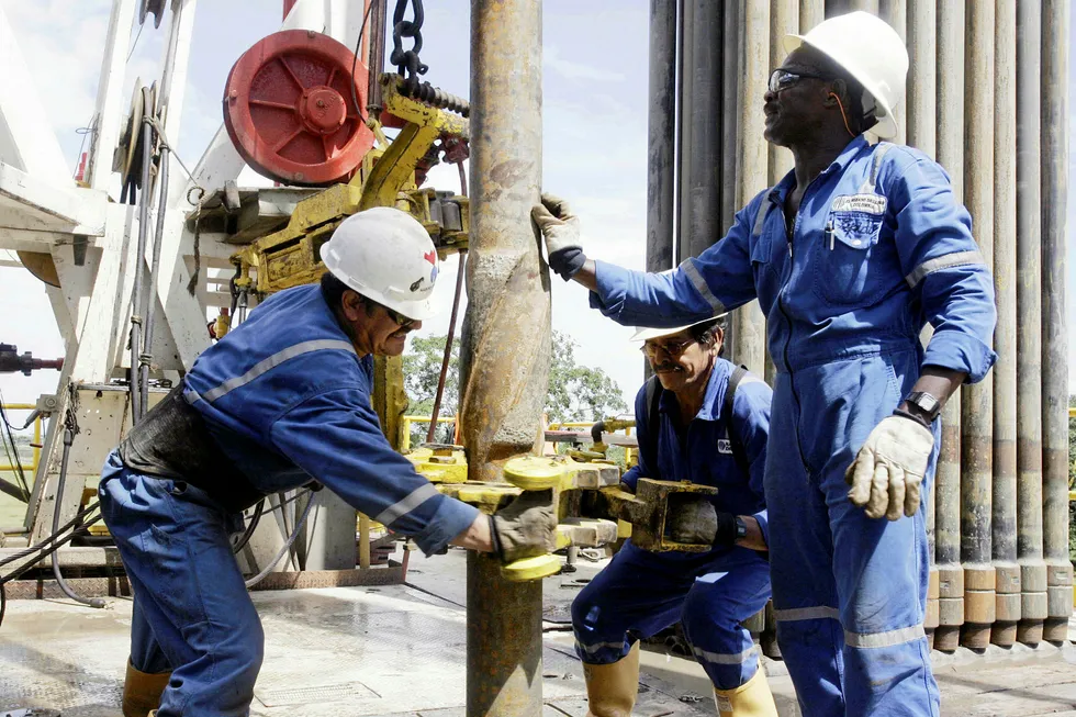 On site: workers at drilling operation in Colombia