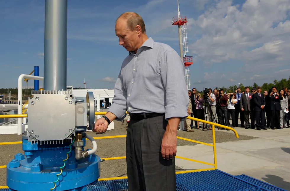 Neighbours: President Vladimir Putin at the Russia-China oil pipeline in Russia's Far Eastern region of Amur in 2010