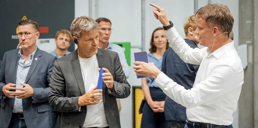 German climate minister Robert Habeck talks to Meyer Burger CEO Gunter Erfurt at a recent visit to a new cell factory