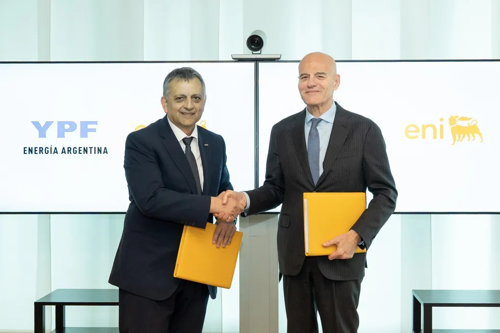 YPF chief executive Horacio Marin (left) and Eni chief executive Claudio Descalzi.