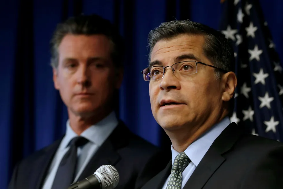 Prosecution: California Attorney General Xavier Becerra, foreground, with Governor Gavin Newsom