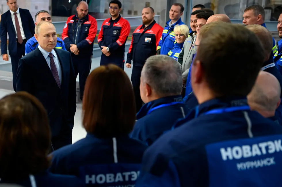 Russian President Vladimir Putin speaks to Novatek employees at a specialised construction yard near the country's port of Murmansk.