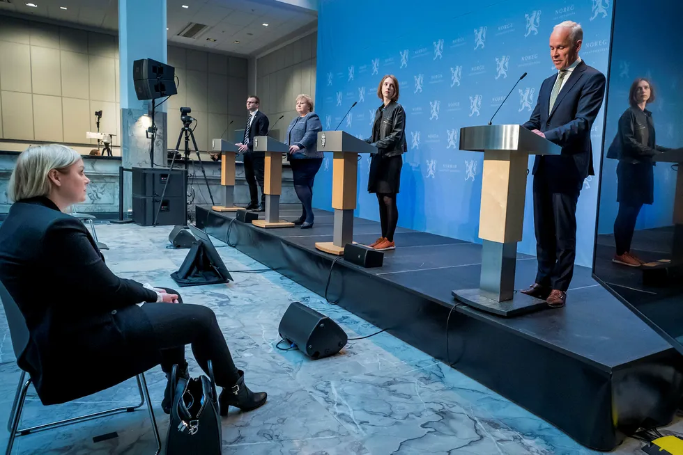 Tax plans: Norway's Energy Minister Tina Bru listens to Finance Minister Jan Tore Sanner's presentation of temporary changes in the petroleum tax system.