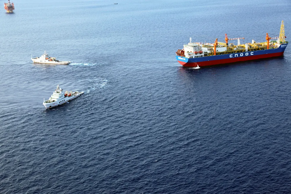 Production: the Hai Yang Shi You 118 FPSO being hooked up to the Enping oilfield in the South China Sea