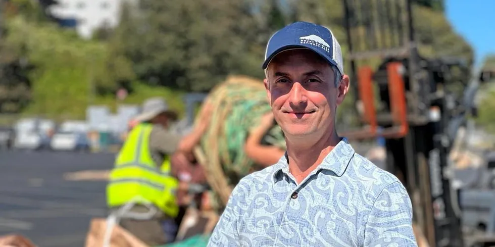 Tim Fitzgerald helps dismantle an old pollock net at Pier 91 on Sept. 6, 2022.