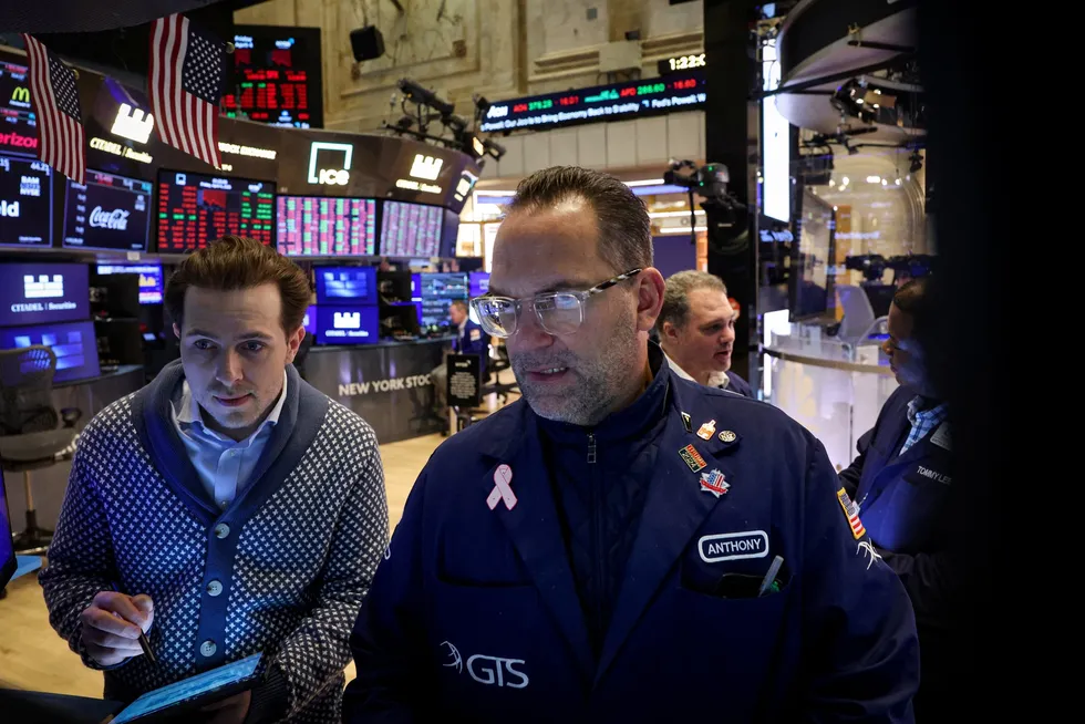 Traders work on the floor at the New York Stock Exchange (NYSE) in New York City, US, on Friday, 4 April 2025.